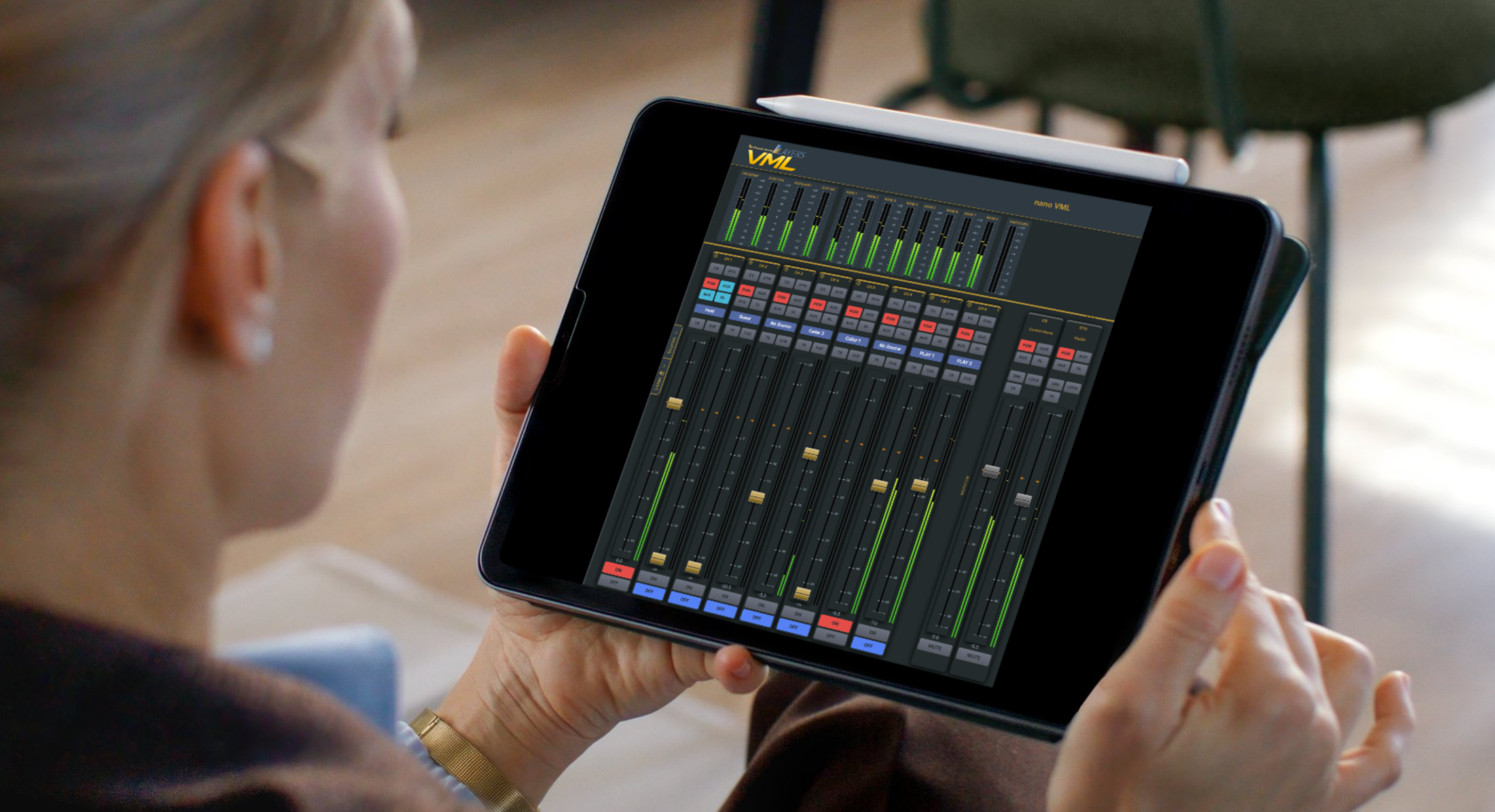 Layers VML on a tablet being held by a woman